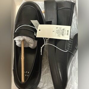 Women’s black flat loafers